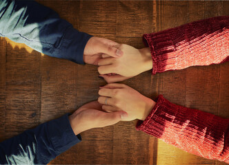 Coffee shop, table and people holding hands with love on anniversary, date and empathy with care....