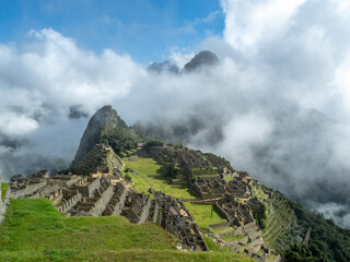 Early morning before the crowds arrive and before the clouds completely clear at Machu Picchu.