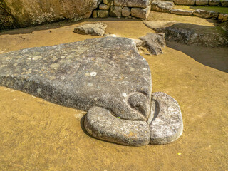 Famous rock formation in the shape of a condor at the Temple of the Condor in Machu Picchu, Peru. 