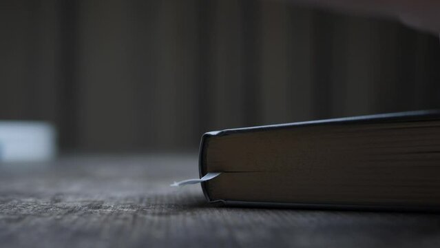 close up of book being closed