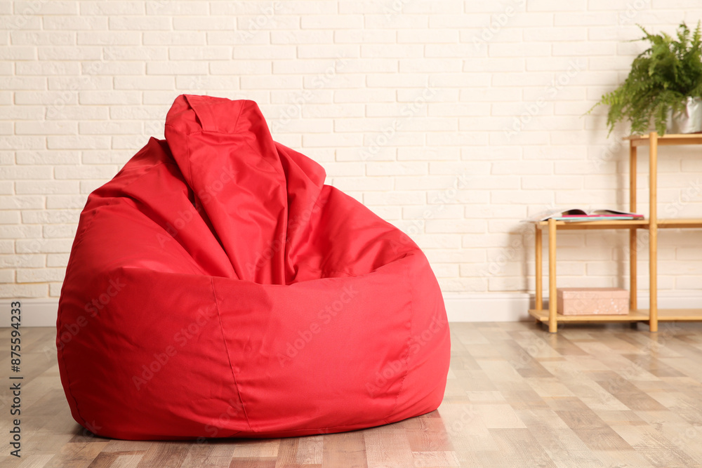 Canvas Prints Red bean bag chair on floor in room