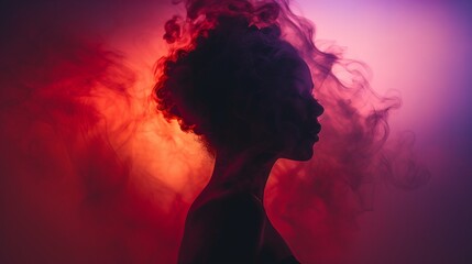 a silhouette of a woman with smoke coming out of her hair