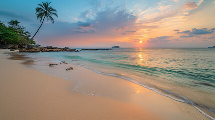 beautiful beach with clean sand and distant palm trees at sunset