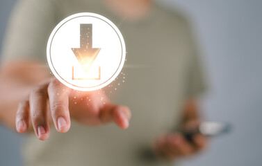 Man hand pushing download icon with virtual screen