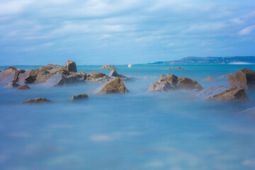 Dublin, Ireland - Rocks and waves on the seaside