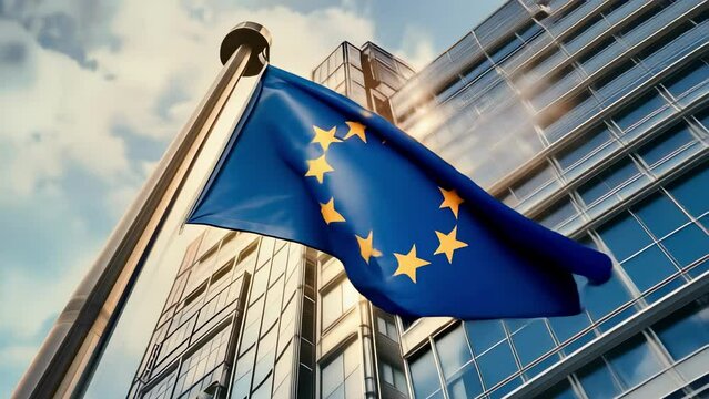 Flag of European Union waving in the wind in front of the modern parliament building on sunny day. Motion animation. Happy Europe day. European Parliament elections. European dream. Future of Europe