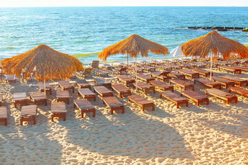 Sandy beach with no people in Odesa Ukraine. Beach with many umbrellas and chairs. Beach is empty...