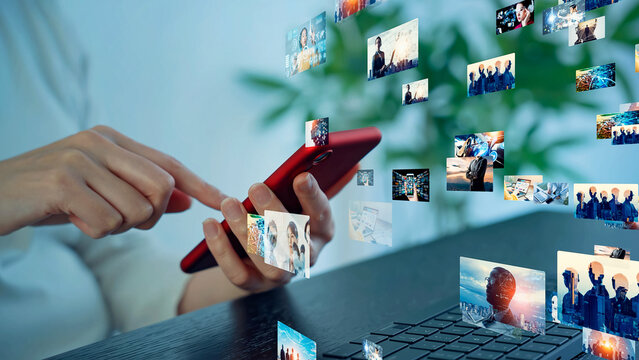 A woman using computer and smart phone in office and digital contents concept.