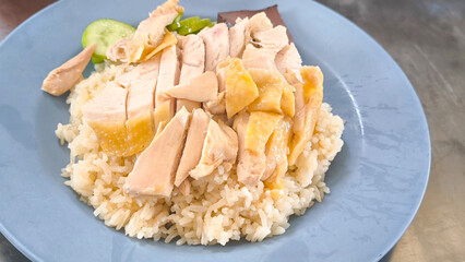 Chicken rice on a plate in a restaurant