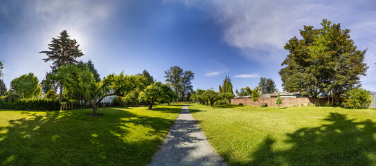 Pathway in a city park. Sunny Morning. Chilliwack, BC, Canada