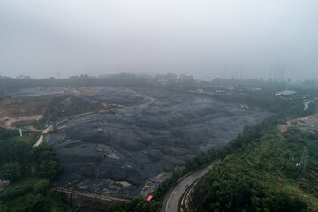 Fototapeta premium Aerial photography of an open-air garbage disposal landfill covered with anti-seepage membrane