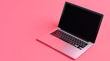 Laptop isolated on a pink background at an angle with an empty black screen