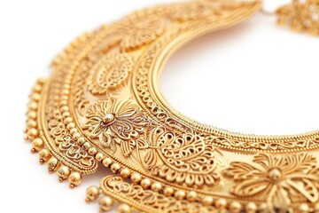 Obraz premium Close up of designer golden necklace jewellery isolated on white background