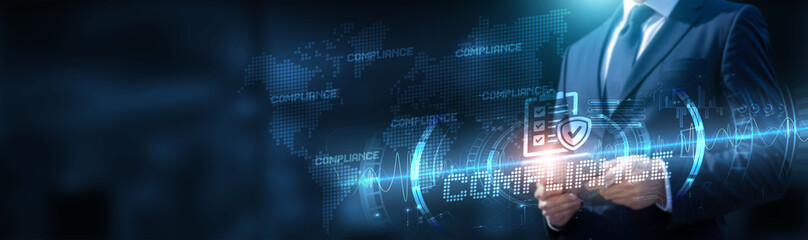 Businessman using tablet on global network connection on compliance and integration with real-time data and development of strategic initiatives. Technology and regulatory. Efficiency and security.