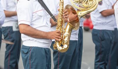 Fototapeta premium Police force officers with a musical instruments in the city.