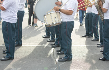 Police force officers with a musical instruments in the city.