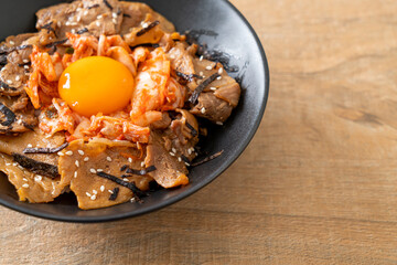 pork bulgogi rice bowl with kimchi and Korean pickled egg