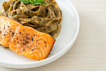 pesto fettuccine spaghetti pasta with grilled salmon fillet
