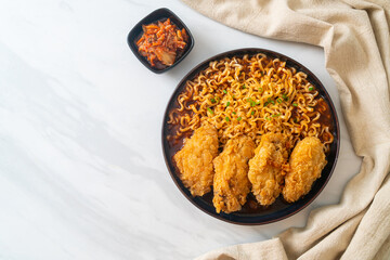 Korean instant noodles with fried chicken or Fried chicken ramyeon