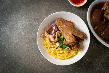 Egg noodles served dry with braised duck