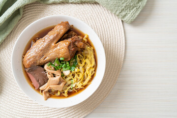 egg noodles with stewed and braised duck in brown soup