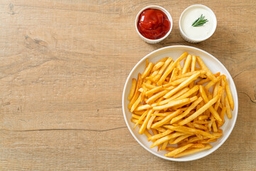 French fries with sour cream and ketchup