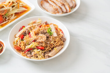 Instant noodles spicy salad on plate