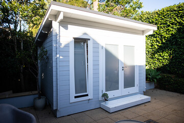 Modern hampton white grey backyard storage garden shed organise clever tidy tiny house shadow