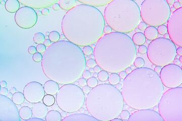 Abstract background of colorful bubbles of oil in liquid