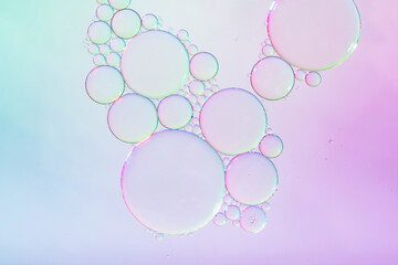 Abstract background of colorful bubbles of oil in liquid