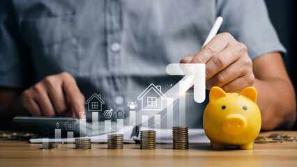 Man Calculating Finances with Piggy Bank and Stacked Coins, Growth in Investments and Savings for...