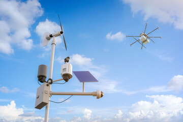 Agriculture technology with weather station and drone fly above © phonlamaiphoto