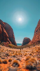 A desert landscape with a sun shining brightly in the sky