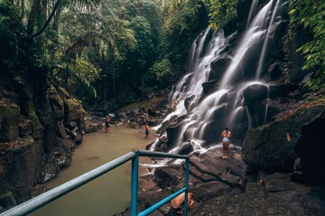Kanto Lampo Waterfall Bali one of the most beautiful tropical waterfalls in tropical rainforest jungle near Ubud, Bali Indonesia