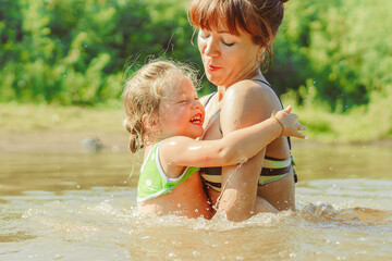 mom and child swim in the river