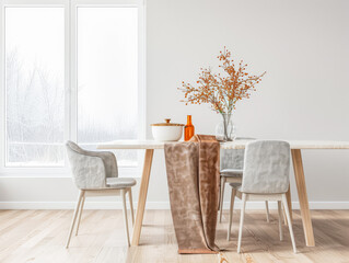 Elegant room interiors in a luxury property with a dinning table next t a large window. Luxury residential Real Estate composition with copy space and plain lighting.
