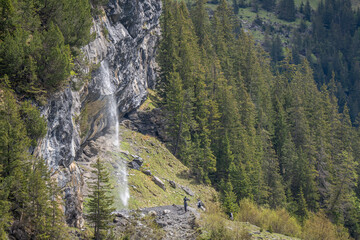 tourist can go to oeschinensee by train from spiez to kandersteg and move to cable car to...