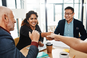 Business people, happy woman or shaking hands in agreement for funding, meeting or partnership. Collaboration, investor or investment banker greeting manager for financial advice or negotiation deal © ReeseArcurs/peopleimages.com