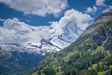 tourist go to travel in Zermatt to take a rest , walk ,hiking ,and see matterhorn mountain ,beautiful city viewpoint from top view Switzerland
