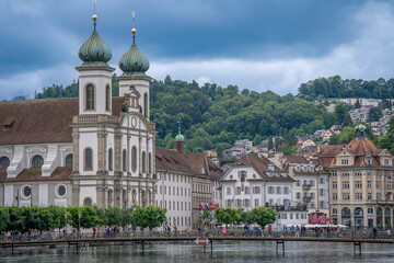 Obraz premium amazing beautiful city where tourist can see architecture old town city cow , river cruising wooden bridge at Lucerne Switzerland 