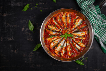 Sardines stewed in tomato sauce with spices. Lunch or dinner. Diet menu. Keto diet. Top view