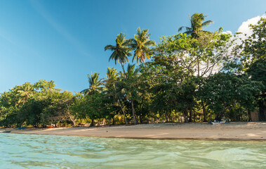 Beautiful tropical beach and sea with coconut palm tree in paradise island