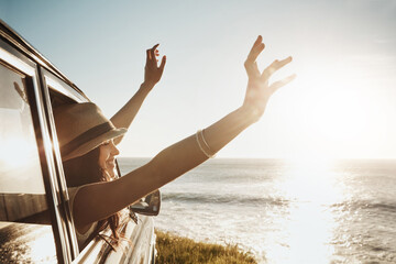 Happy girl, window and stretching with sunset in car for road trip, adventure or stop by ocean coast in nature. Young female person enjoying journey, summer vacation or travel for freedom or drive