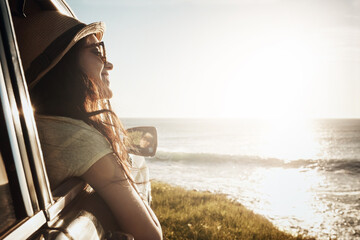 Woman, sea and window in car for road trip with view, sunshine and mockup space on vacation. Girl, person and vehicle for travel, transport and outdoor with smile by ocean with memory in Australia