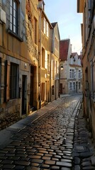 Fototapeta premium Cobblestone Street in European City During Sunset