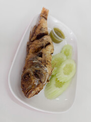 Thai food deep fried fish with seafood sauce