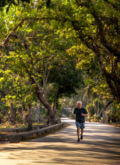 Obraz premium Senior man going for a run