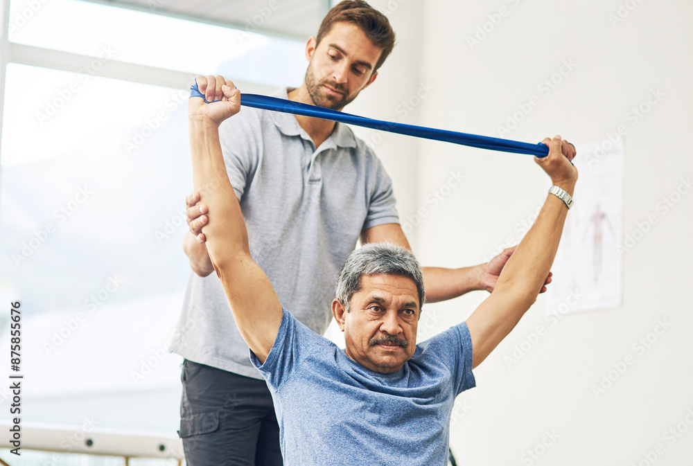 Wall mural Elderly man, exercise and resistance band with physiotherapist for rehabilitation, wellness and fitness. Senior person, workout and stretching muscle for management of pain, arthritis and body health