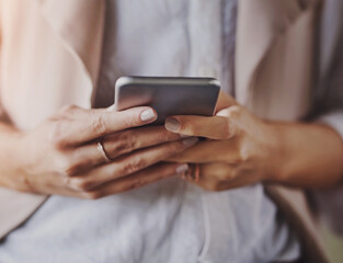 Person, hands and typing with phone for news, social media or online browsing on app. Closeup of...