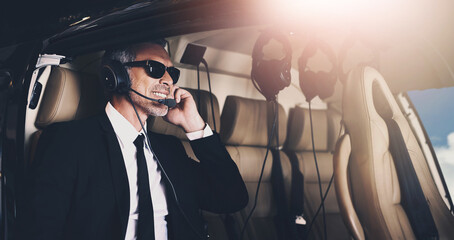 Happy man, pilot and flying with headphones for travel or international trip for job or career opportunity on flight. Businessman with smile or headset on airplane for private journey or adventure